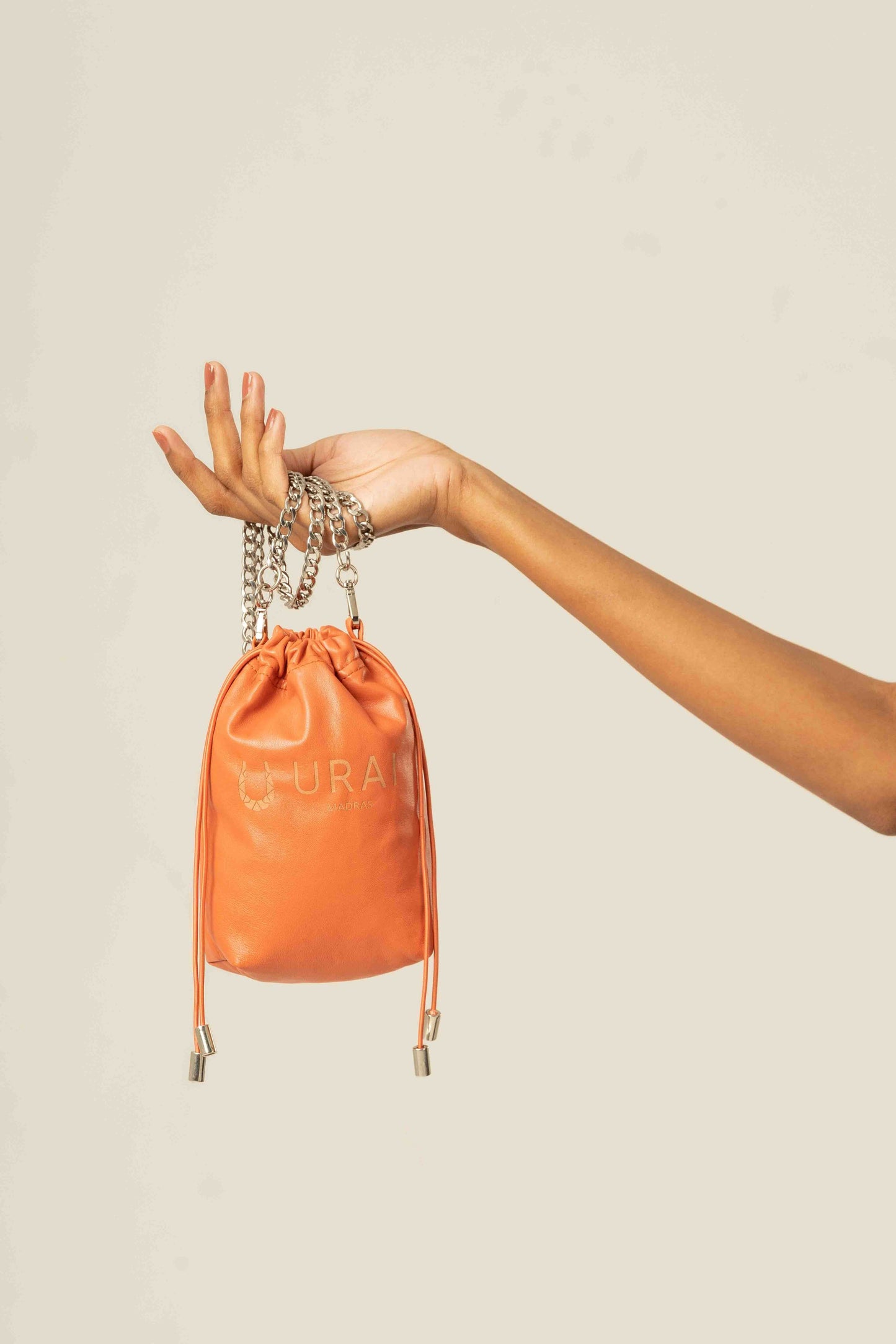 Saaral- Micro-Sling Bag in Mild Tangerine